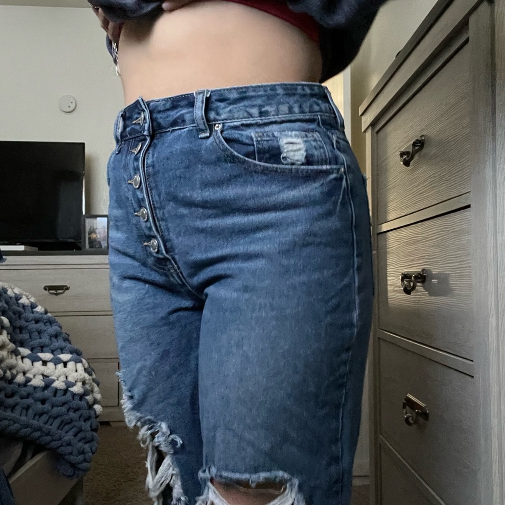 Distressed Blue Denim Jeans